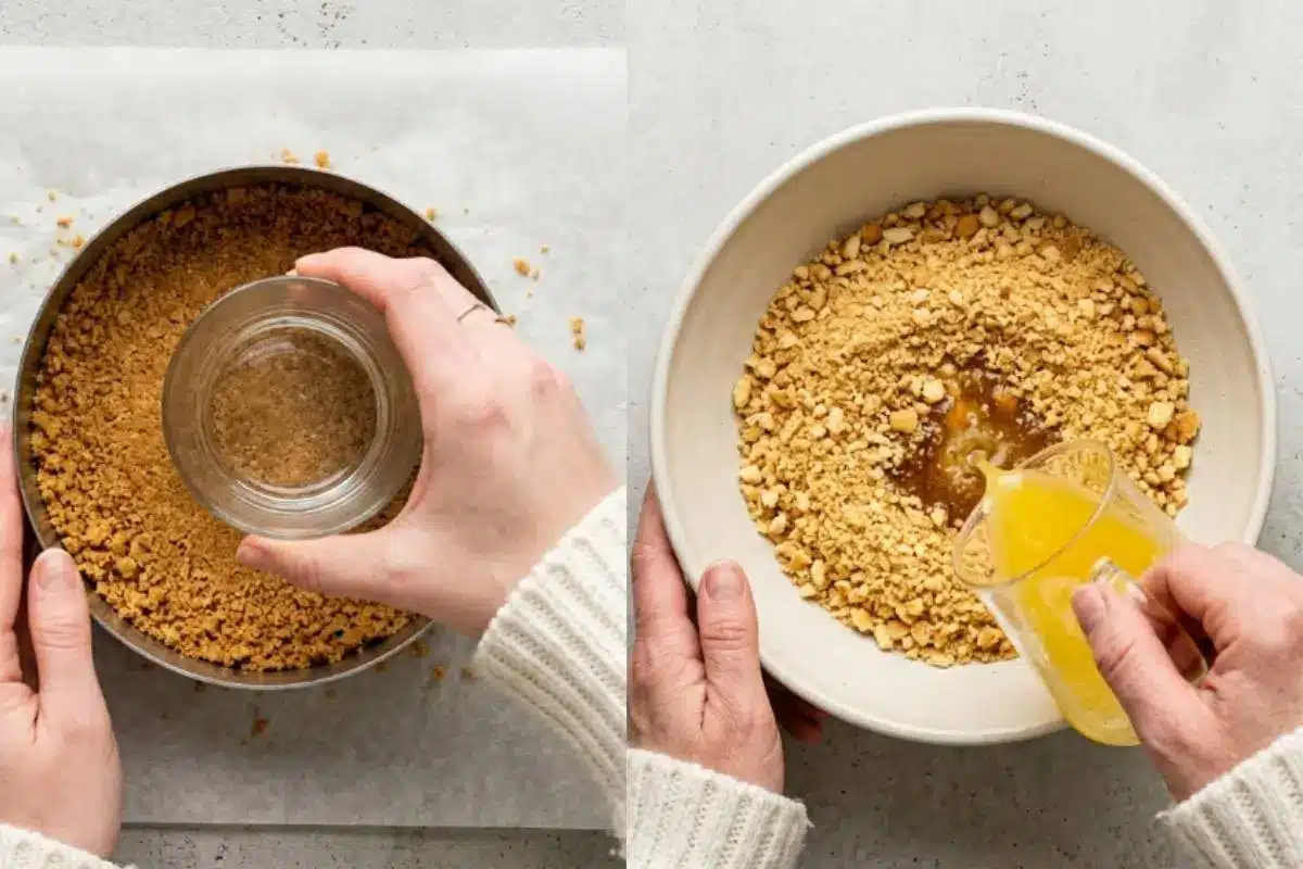 The Golden Rule Step-by-Step For Banana Cheesecake Captured from an overhead static angle on a light-grey textured concrete backdrop, this split image shows the step-by-step process for making a banana cheesecake cookie crust. On the right, hands pour melted yellow butter into a bowl of crushed cookies; on the left, a hand gently uses a glass to press the golden crumb mixture firmly into a round baking pan.