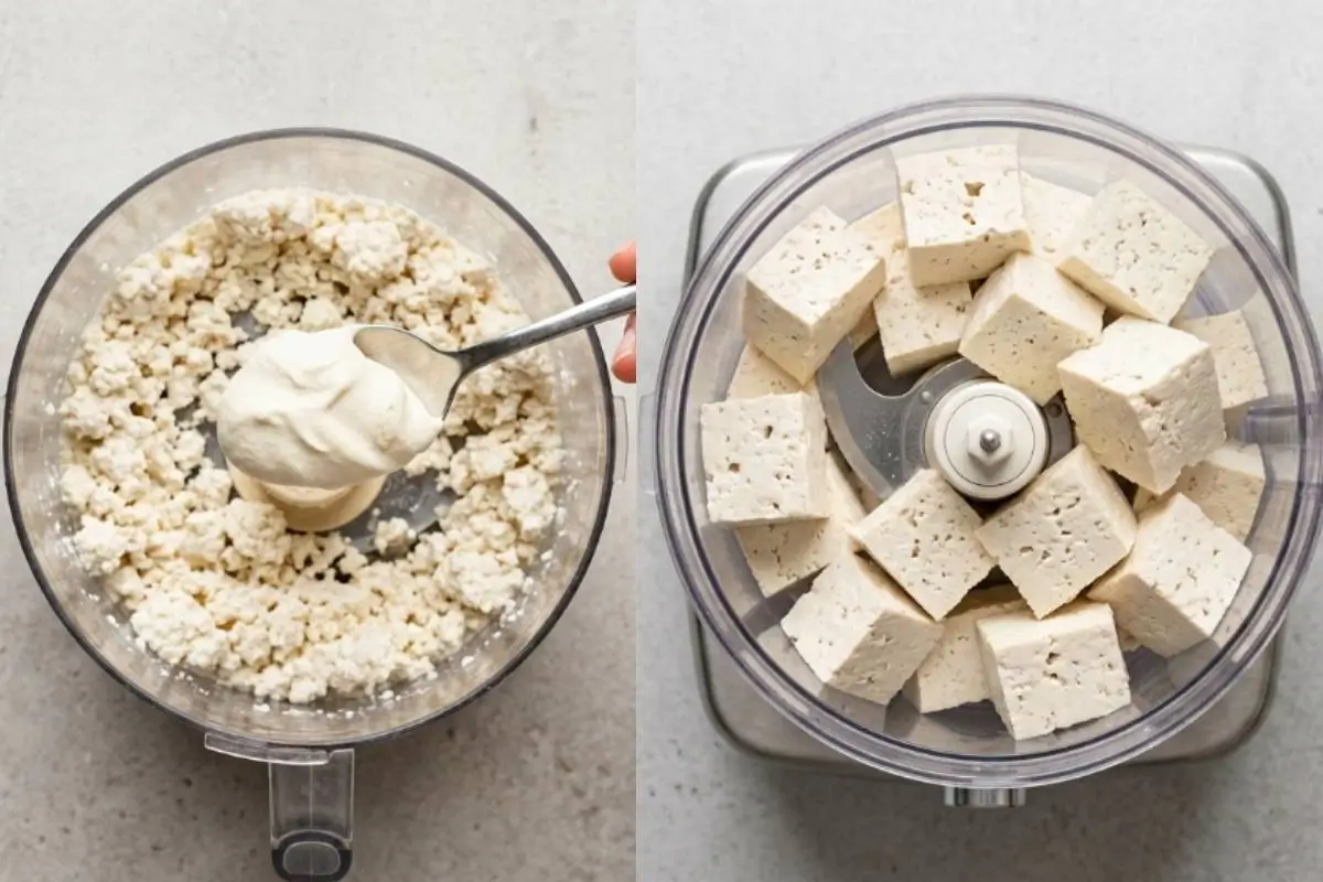 The Golden Rule Step-by-Step For Vegan Ricotta Cheesecake An overhead view on a light-grey textured backdrop showing the step-by-step process for vegan ricotta cheesecake, featuring cubed tofu in a food processor on the right, and the beautifully blended, creamy dairy-free ricotta being scooped with a silver spoon on the left.